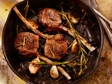 Rack of Lamb with Garlic, Rosemary and Peppercorns in a Cast Iron Skillet- Photographed on Hasselblad H3D2-39mb Camera