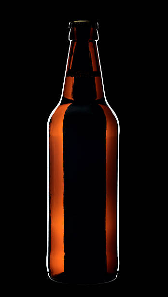 istock Bottle of beer, isolated on a black background 153538795
