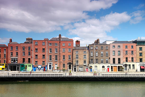 River Liffey and colorful buildings at summer day in Dublin stock photo