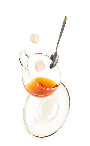 istock cup of tea with a spoon and sugar 153539895