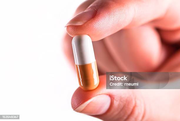 Pill In The Hand Stock Photo - Download Image Now - Capsule - Medicine, Dose, Excess