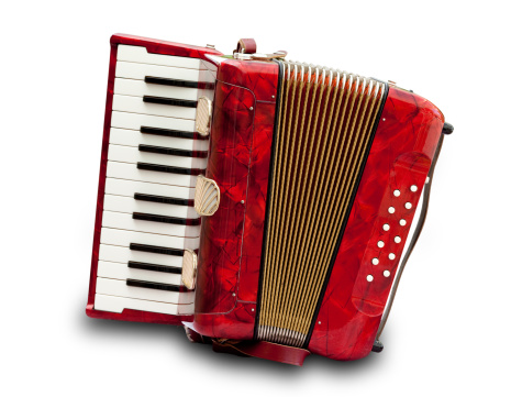 Retro small red accordion isolated on white