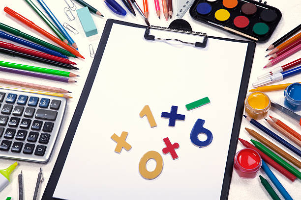 istock clipboard with school supplies 153550036
