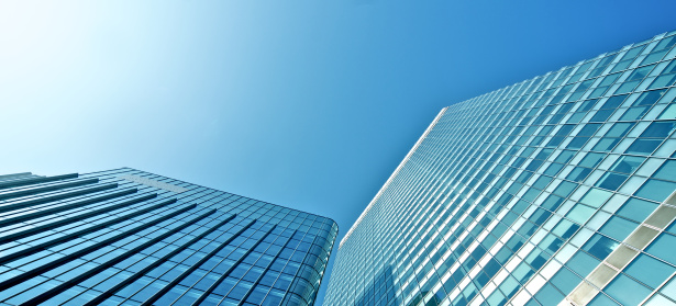 Modern glass office buildings and blue sky