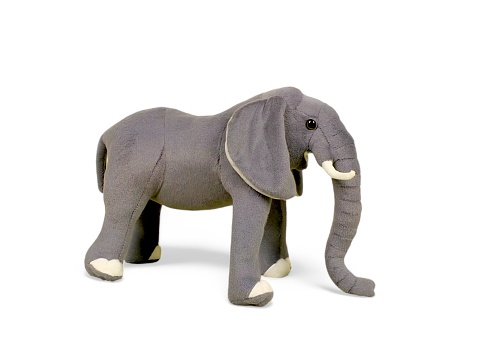 Elephant doll side view isolated on white
