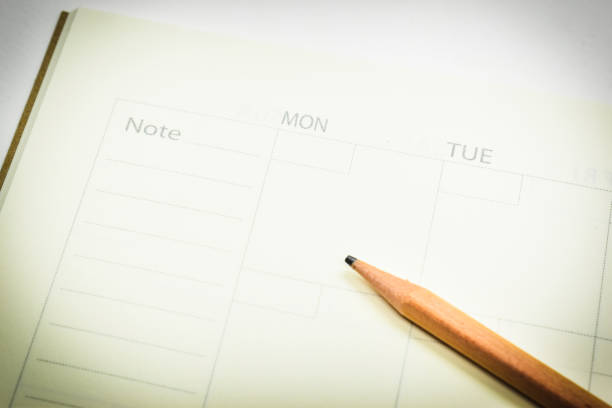 istock top view image of open planner notebook with blunt wood pencil 1535512117
