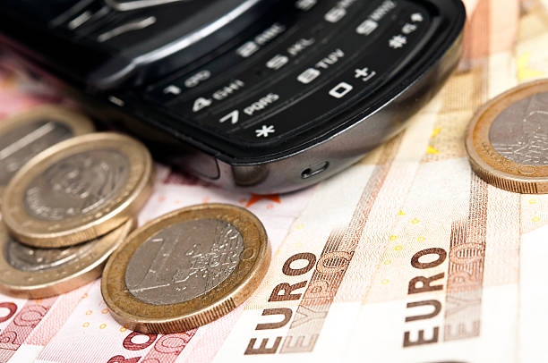 istock Coin and phone 153551234