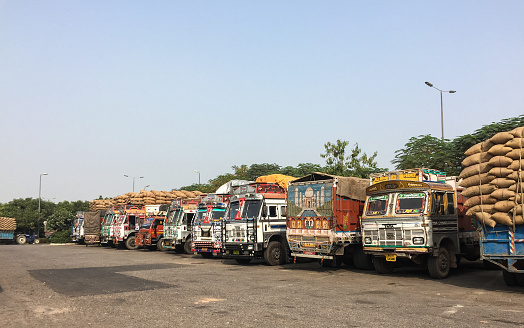 Agra, India - Nov 5, 2017. Truck trailers on rest area in Agra, India. Agra is one of the most populous cities in Uttar Pradesh, and the 24th most populous in India.