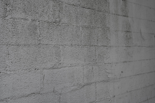 Rough concrete brick wall abstract background