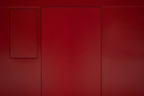 The background wall of the red building