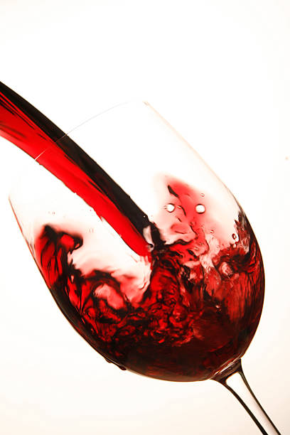 istock Red wine being poured into a glass 153551930