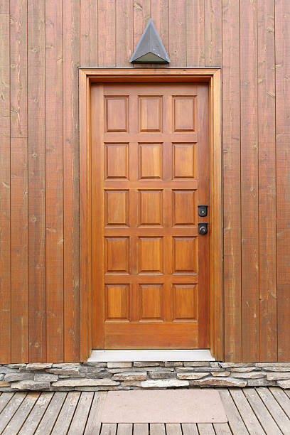 istock wooden door on a paneling wall 153552279