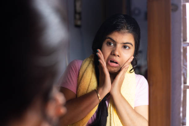 istock Woman in front of mirror 1535525625