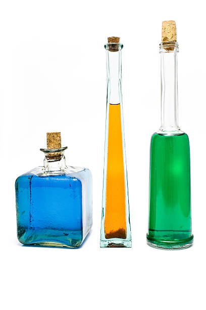 istock Three antique bottles with colorful liquids 153553832