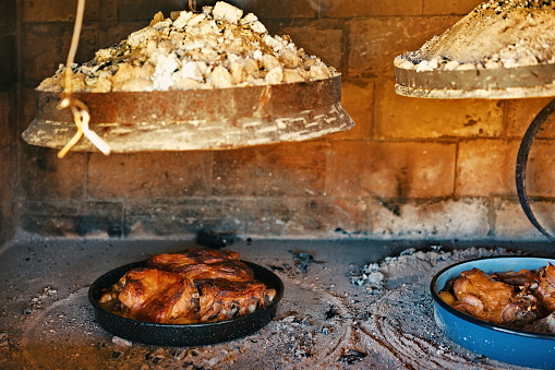 Closeup of traditional grilled meat in the oven on open flame