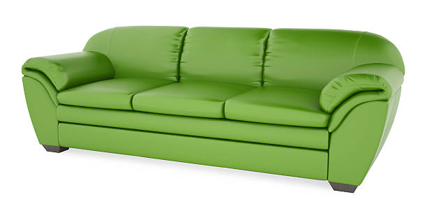 Green sofa on a white background stock photo