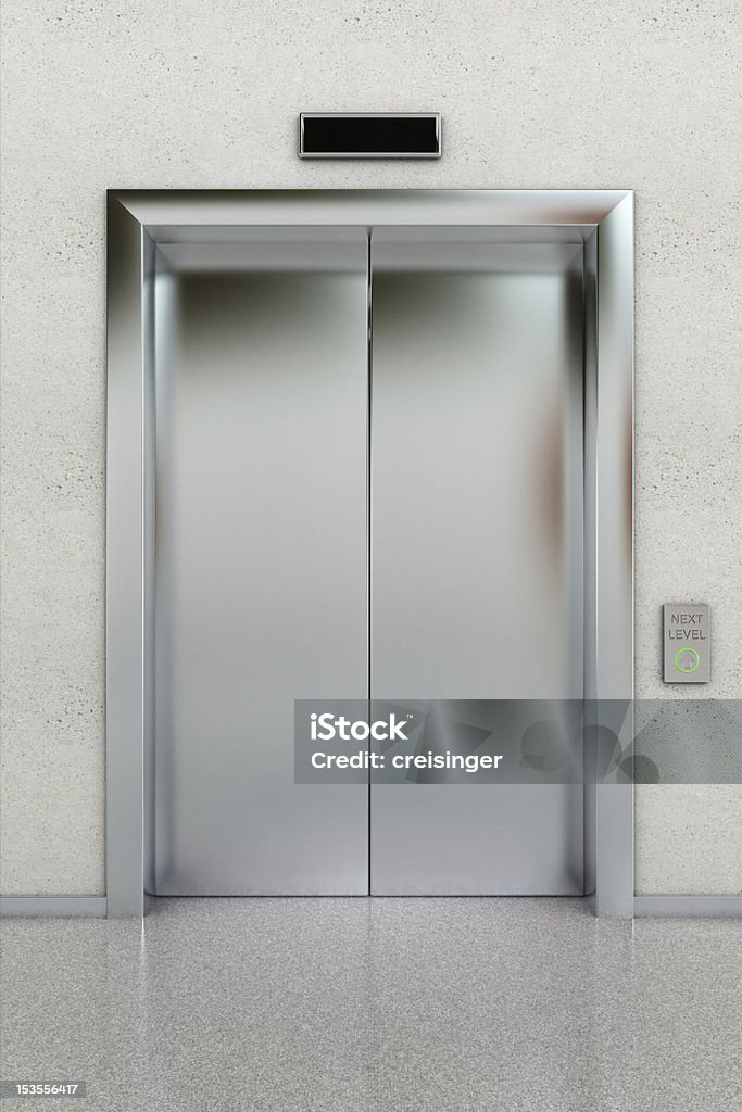 Closed elevator Front view of a modern elevator with closed doors in lobby Elevator Stock Photo