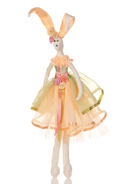 istock Handmade doll  rabbit dressed in a orange  dress 153558725