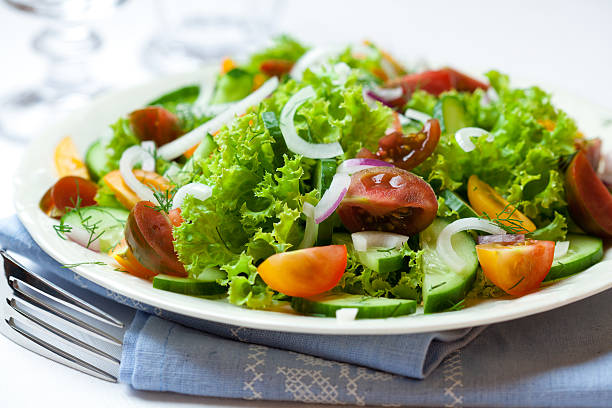 istock Colorful cherry tomato salad on a plate 153559129