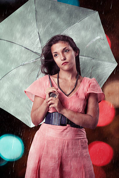 istock Sad girl caught in the summer rain 153559276