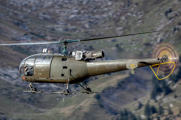 istock Helicopter in the mountains 153559458
