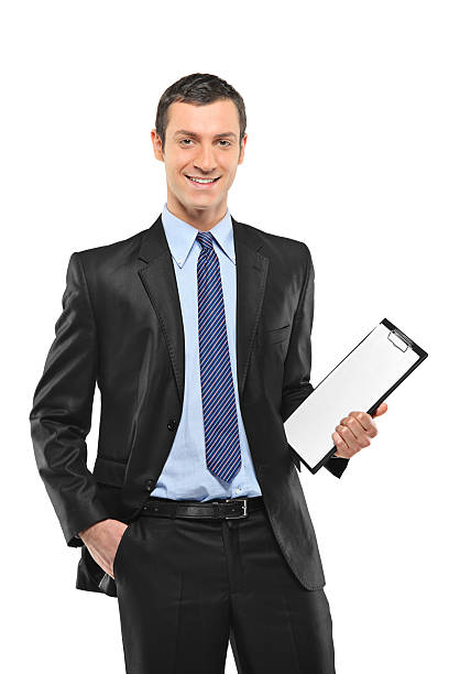 istock Smiling businessperson holding a blank clipboard 153559612