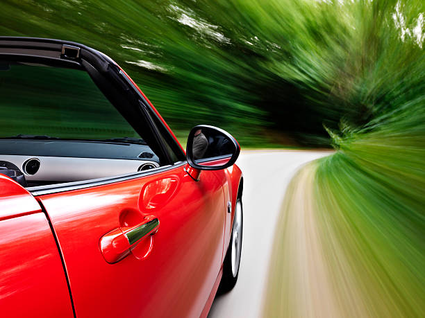 Driving a sports cabriolet stock photo