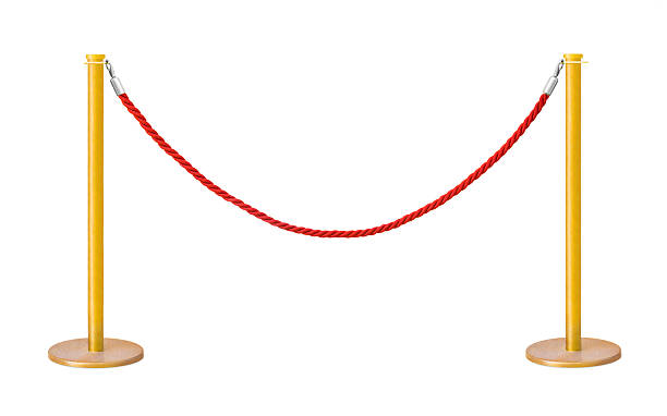 istock Golden velvet rope barrier 153560686