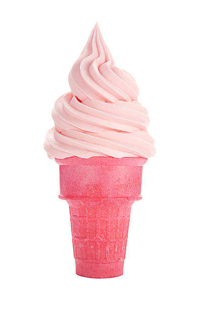 Pink soft serve ice cream or frozen yogurt in matching wafer cone. Could be strawberry, raspberry or cherry flavored. Isolated on a white background.
