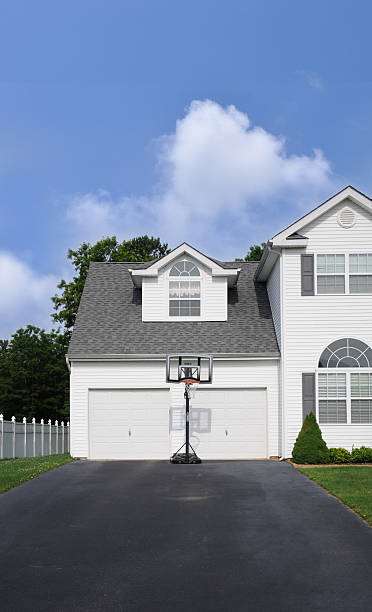 istock Basketball Hoop Suburban Home Driveway 153561176