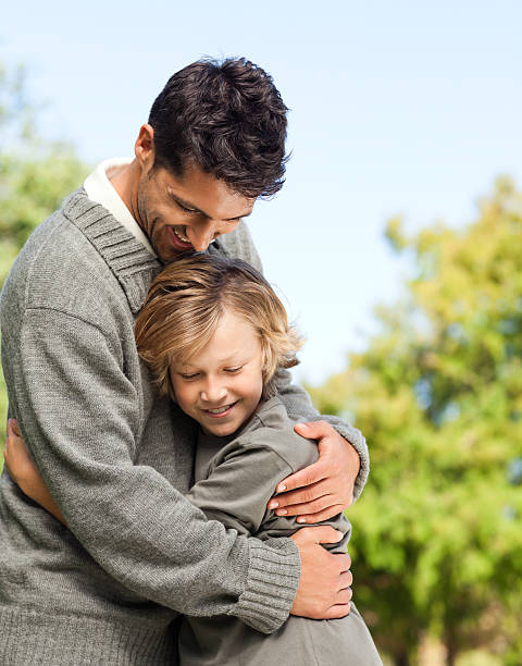 istock Son embracing his father 153561323