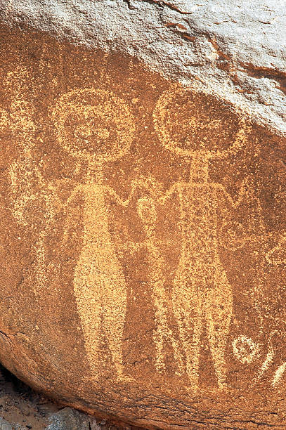 istock Ancient rock art in Niger depicting two figures 153562481
