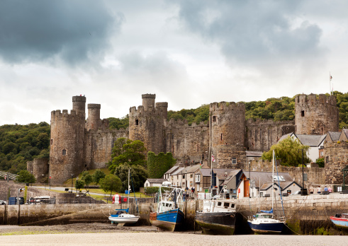 Conwy Castle and harbor at ebb-tide