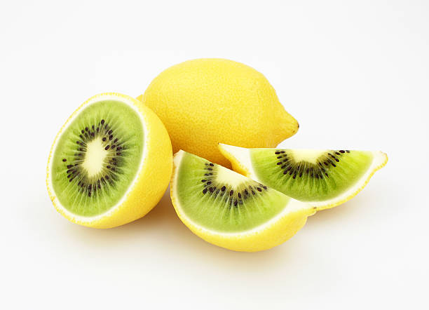 Kiwi or Lemon Lemon skin on the outside, kiwi on the inside. genetic modification photos stock pictures, royalty-free photos & images