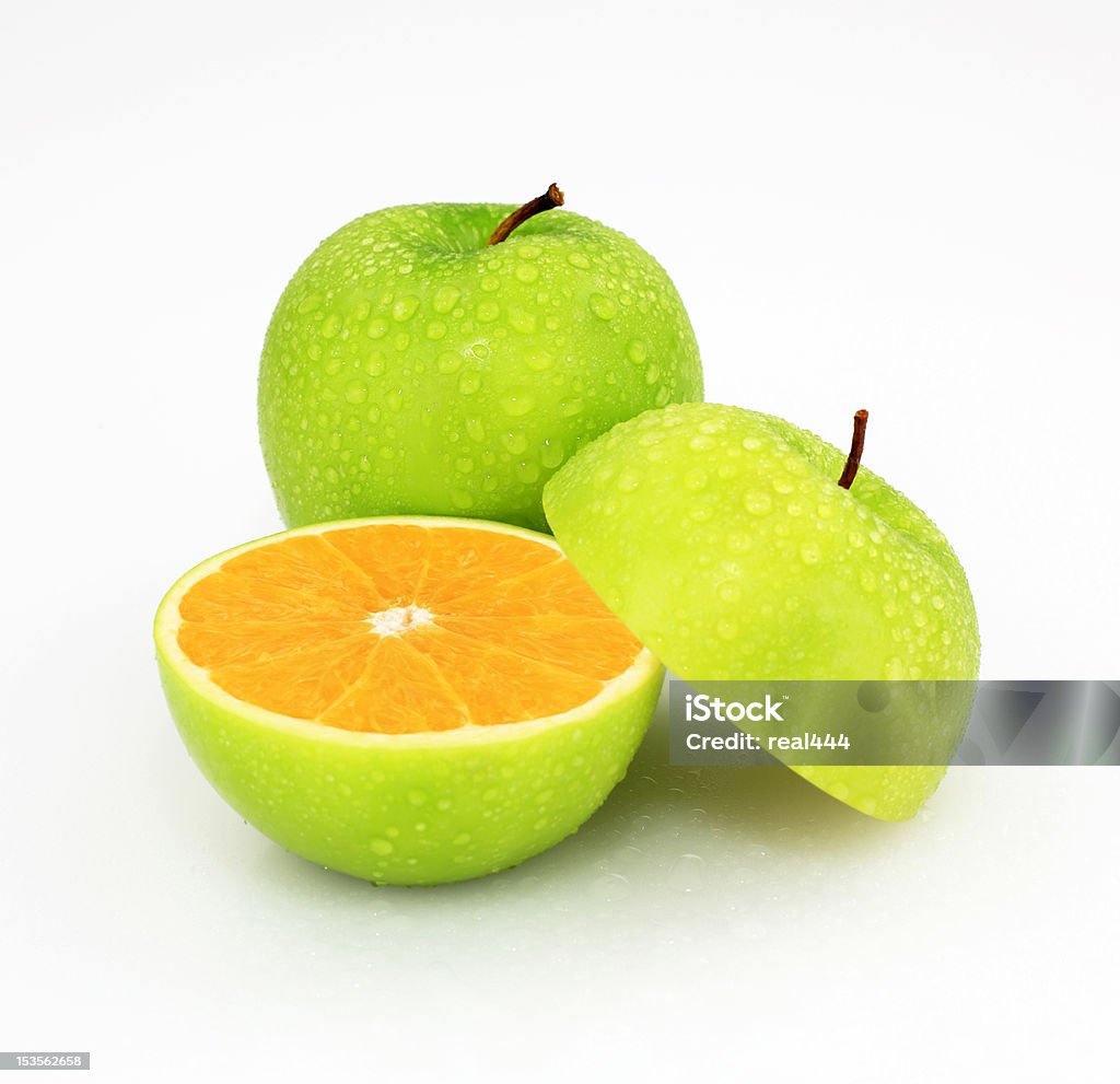 Apple or orange Apple skin on the outside, orange on the inside. Apple - Fruit Stock Photo