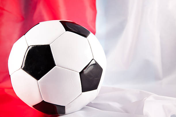 istock soccer ball and polish flag 153562718
