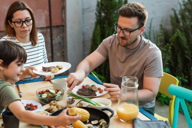 istock family lunch in home backyard 1535627619
