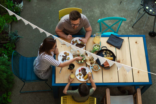 istock family lunch in home backyard 1535627621