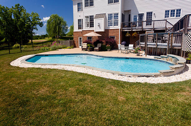 istock Backyard swimming pool and patio 153562968