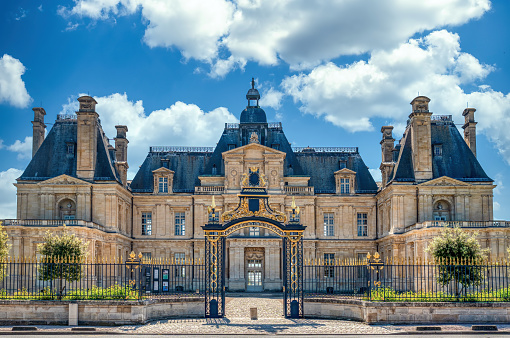 Maisons Laffitte, France - May 25 2023: Facade of the castle of Maisons Laffitte, near Paris.