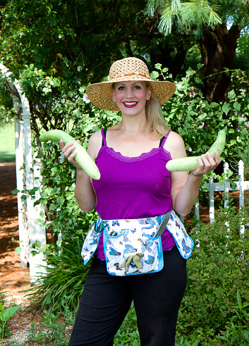 Lady Growing Cucumbers Stock Photo - Download Image Now - Adult, Apron ...
