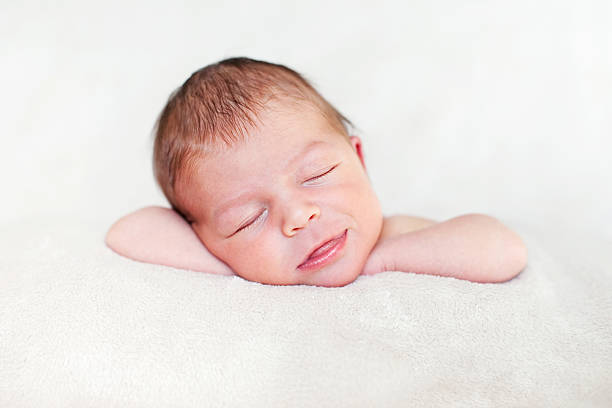 istock adorable newborn baby 153565950