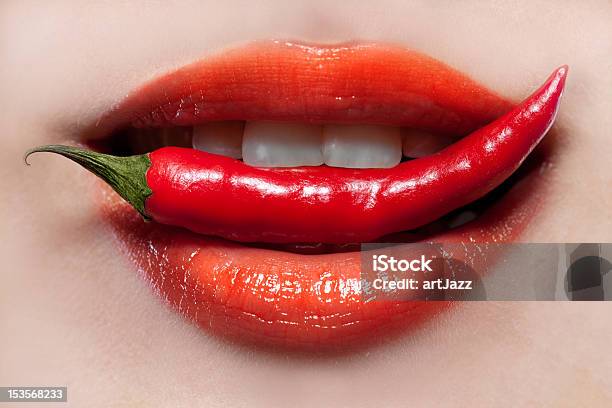Woman Lips And Chili Pepper Stock Photo - Download Image Now - Eating, Food, Spice