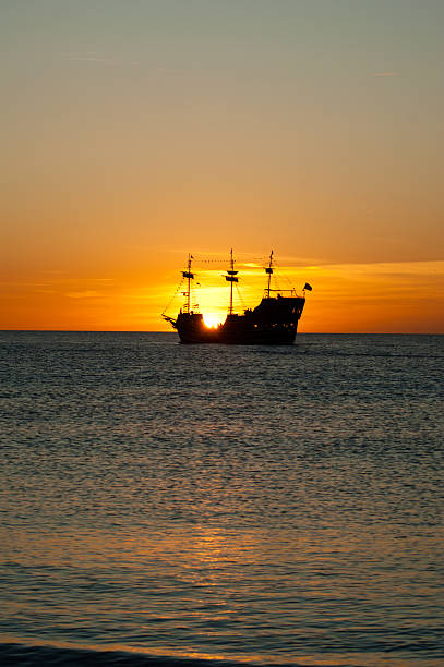 istock Silhouette of Ship at Sunset 153568582