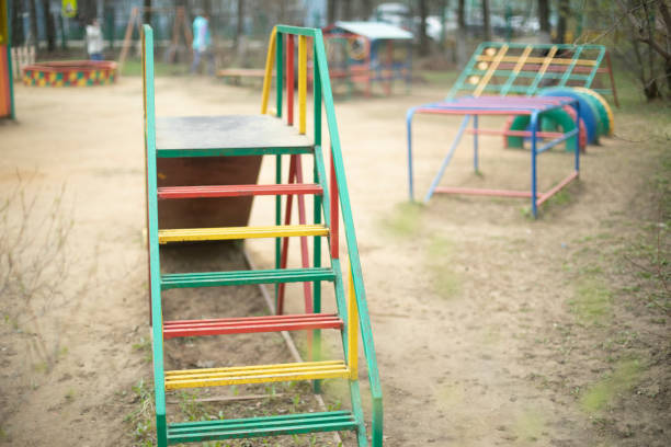Slide on playground. Children's play area. Play area in yard. Slide.