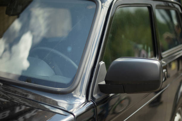 istock Black car in detail. Front rearview mirror. Car windshield. 1535685846