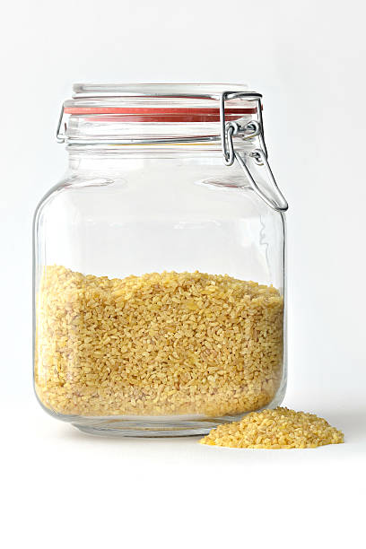 istock Pile of bulgur, with a kilner jar 153569563