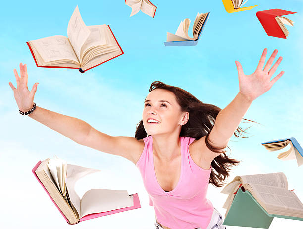 istock Girl with pile colored book . 153569971