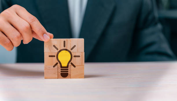 istock Creative Design Solutions with Wooden Blocks: Inspiring Ideas, Strategies, and Collaborative Thinking for Success in Business and Marketing. 1535710185
