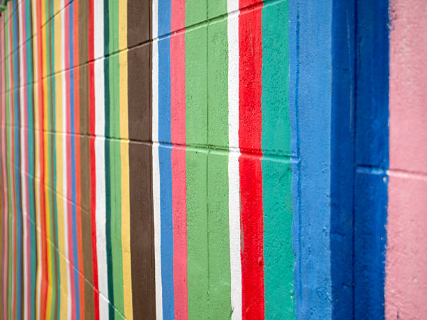 istock Colorful stripes paint on cement wall 153571962
